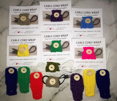Hand knitted cable charger - hand,